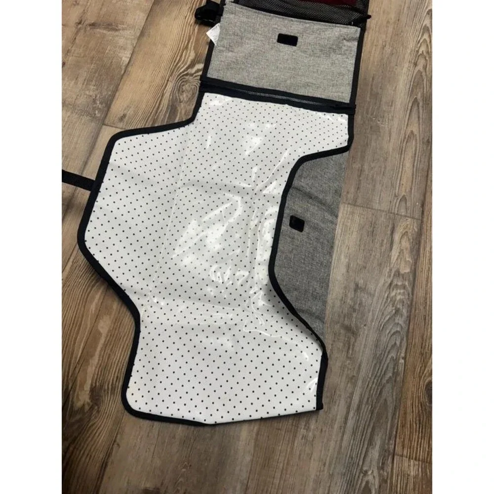 Travel diaper clutch and changing pad